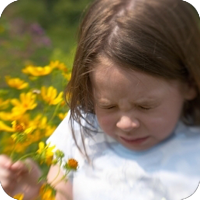 image of young girl about to sneeze